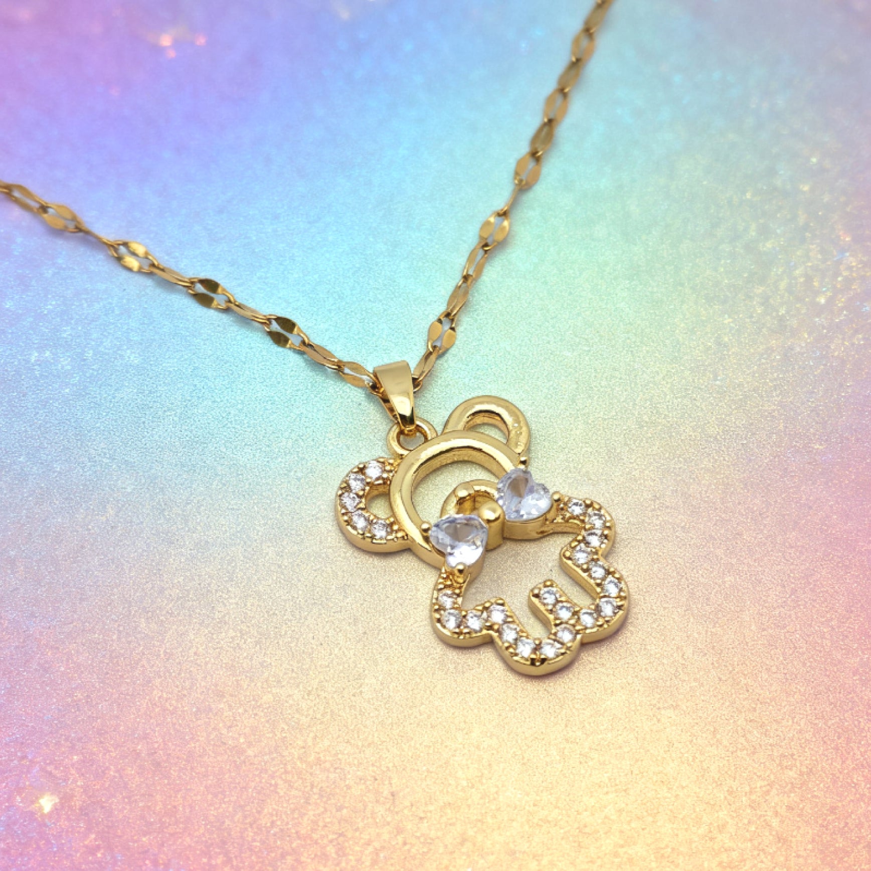 “Étreinte” Bow‑Teddy Pavé Pendant Necklace — 18K Gold‑Plated, Diamond‑Style