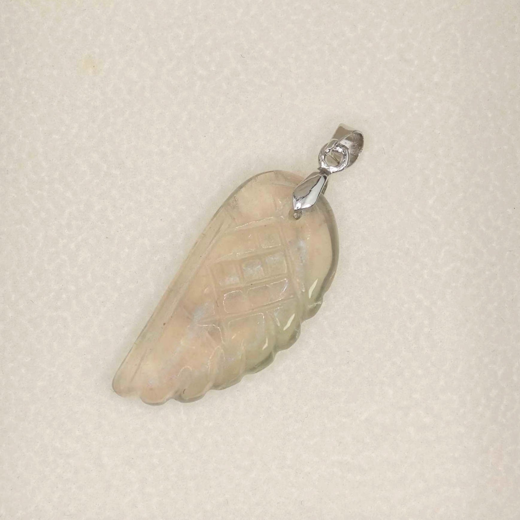 “Léger” Angel Wing Pendant — Hand‑Carved Green Fluorite
