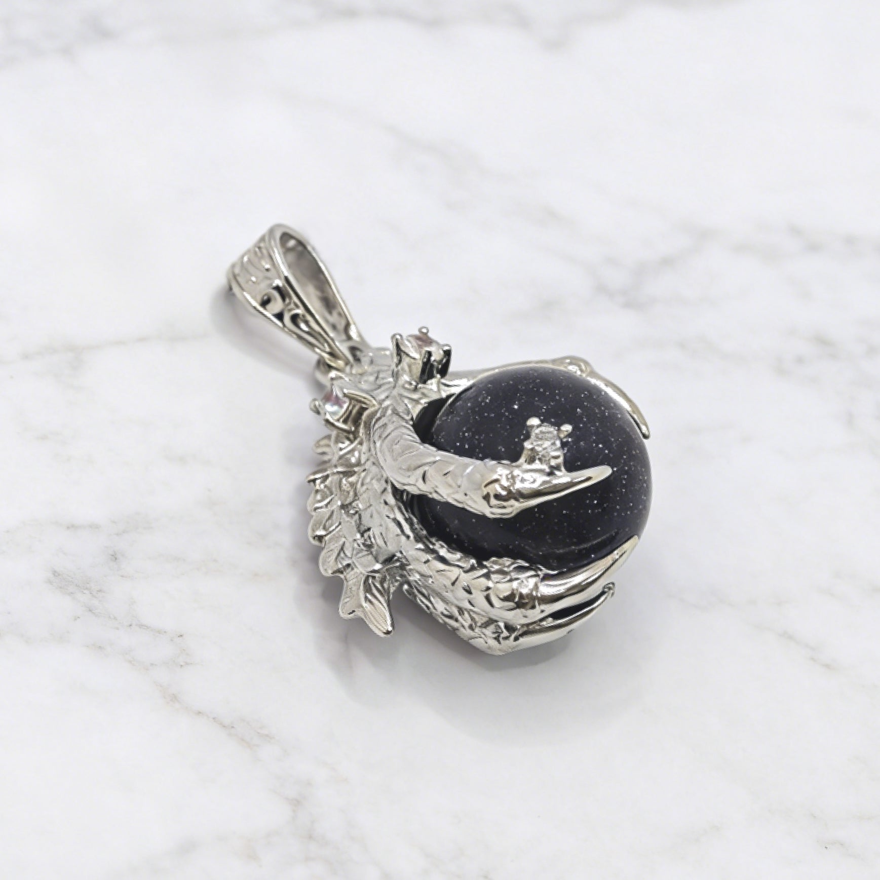 “Léger” Dragon Claw Orb Pendant — Blue Goldstone Quartz