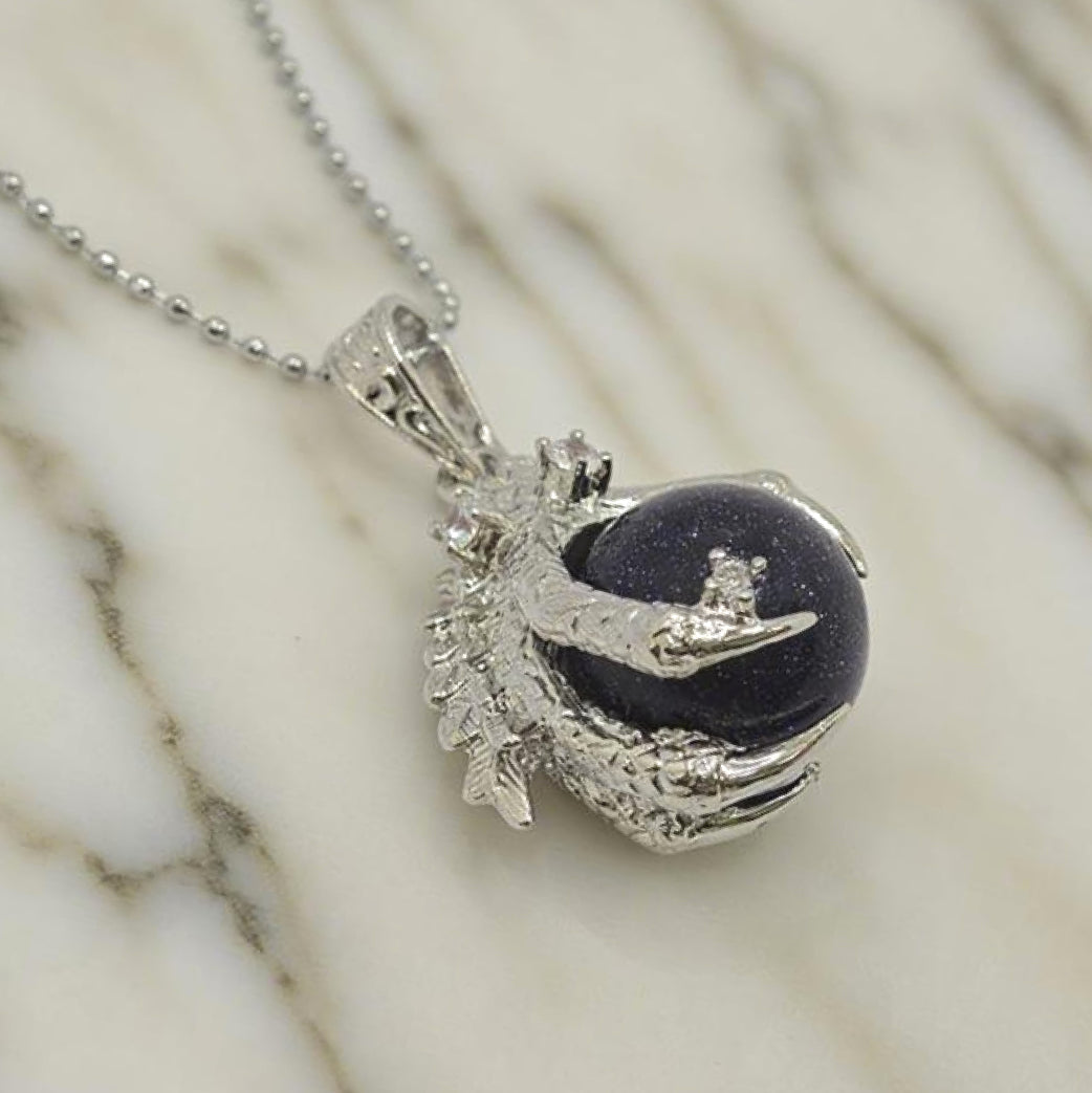 “Léger” Dragon Claw Orb Pendant — Blue Goldstone Quartz