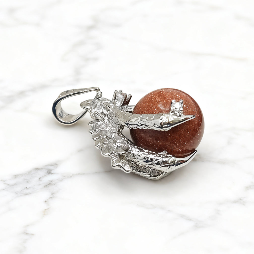 “Léger” Dragon Claw Orb Pendant — Goldstone Quartz