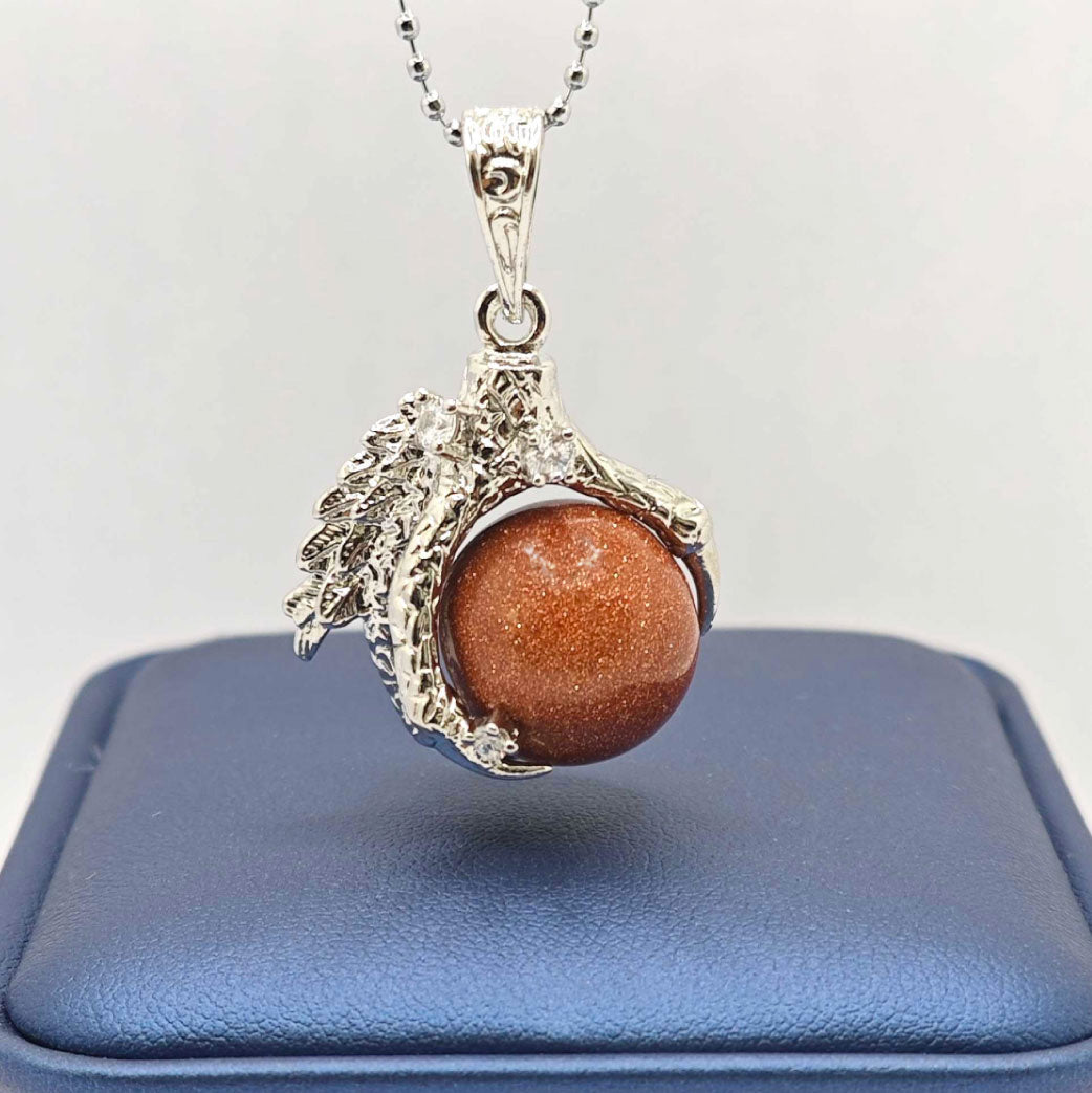 “Léger” Dragon Claw Orb Pendant — Goldstone Quartz