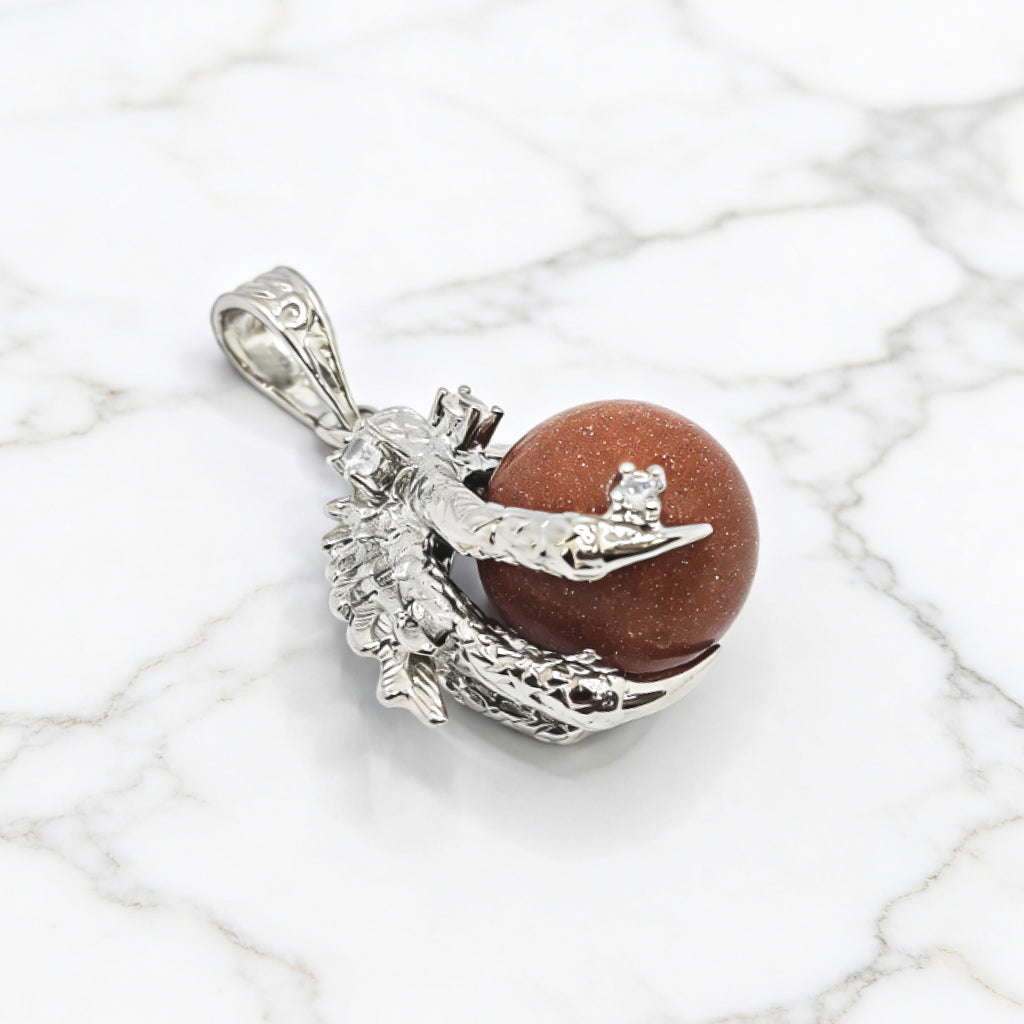 “Léger” Dragon Claw Orb Pendant — Goldstone Quartz