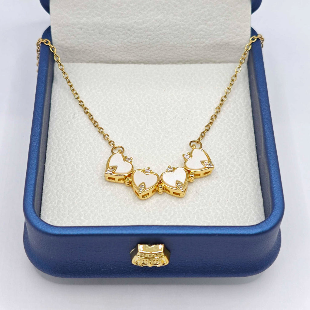 “Étreinte” Clover Pendant Necklace — 18K‑Plated Chain, White Resin