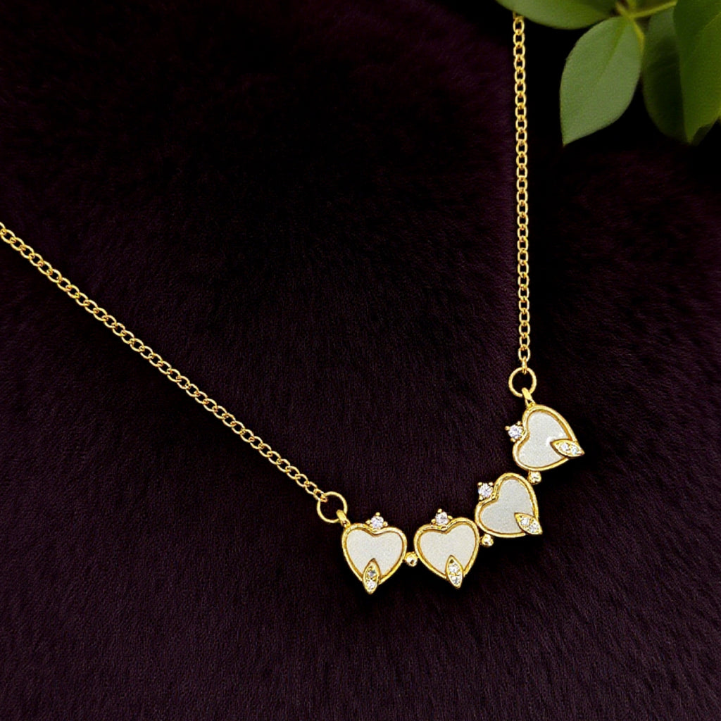 “Étreinte” Clover Pendant Necklace — 18K‑Plated Chain, White Resin
