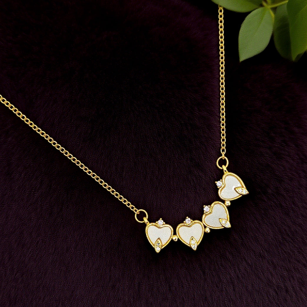 “Étreinte” Clover Pendant Necklace — 18K‑Plated Chain, White Resin