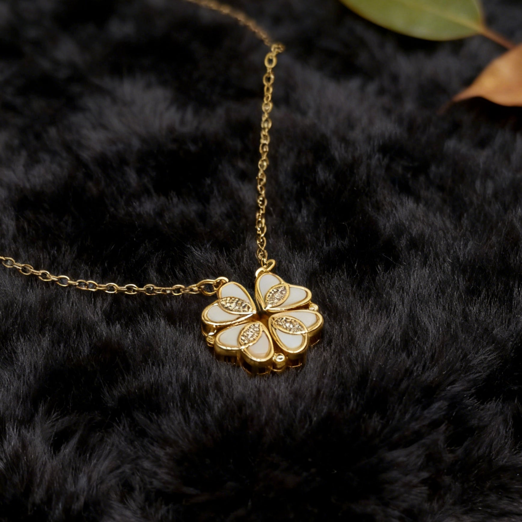 “Étreinte” Clover Pendant Necklace — 18K‑Plated Chain, Cross‑Divided White Inlay