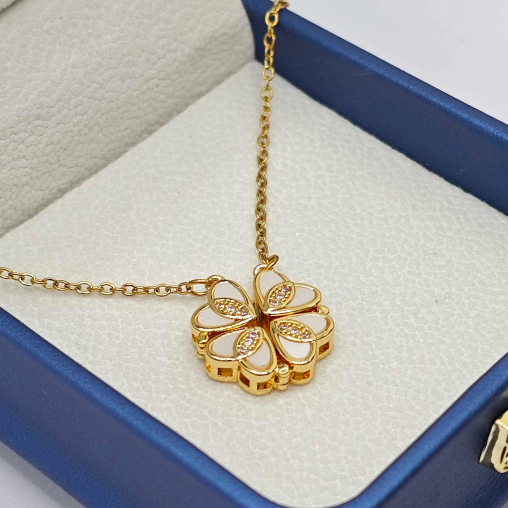 “Étreinte” Clover Pendant Necklace — 18K‑Plated Chain, Cross‑Divided White Inlay