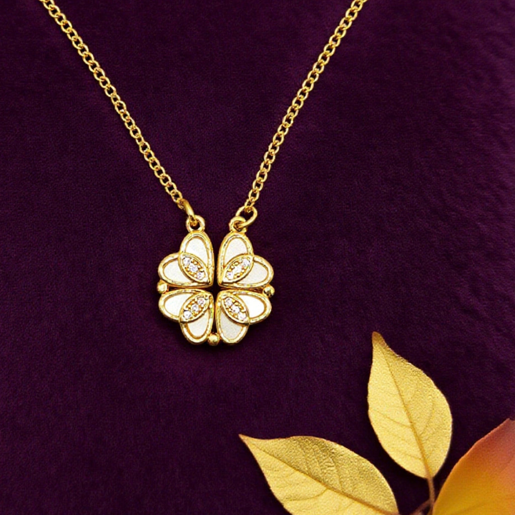 “Étreinte” Clover Pendant Necklace — 18K‑Plated Chain, Cross‑Divided White Inlay