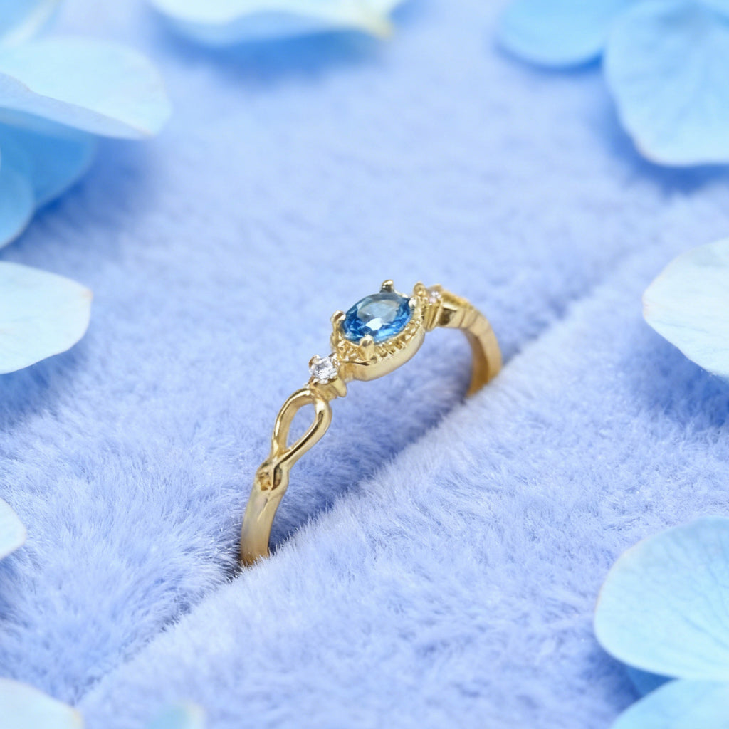 Bague réglable « Toujours » — Plaqué or 14 carats, fausse apatite bleu Paraíba et oxydes de zirconium clairs L’Ardeur