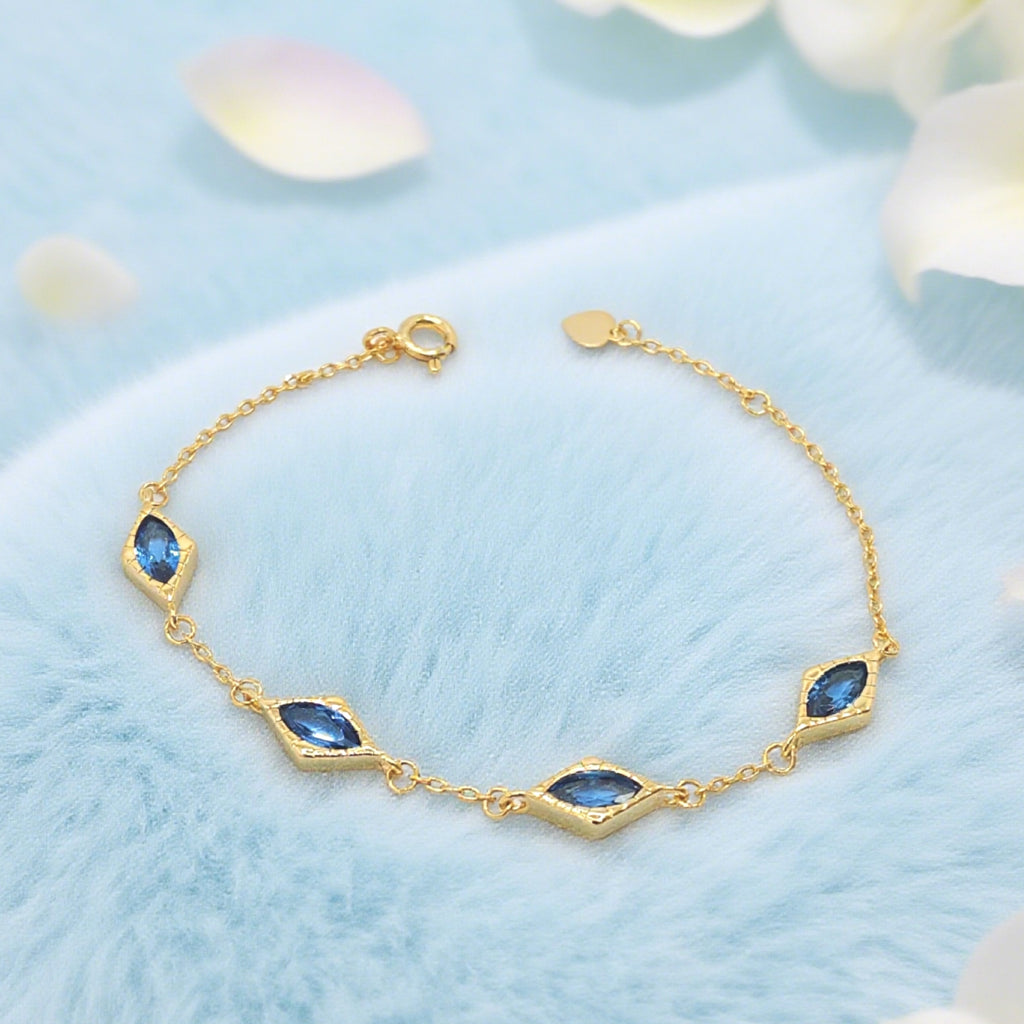 Bracelet « Lien » — Topaze bleue artificielle à maillons diamantés, plaqué or 18 carats