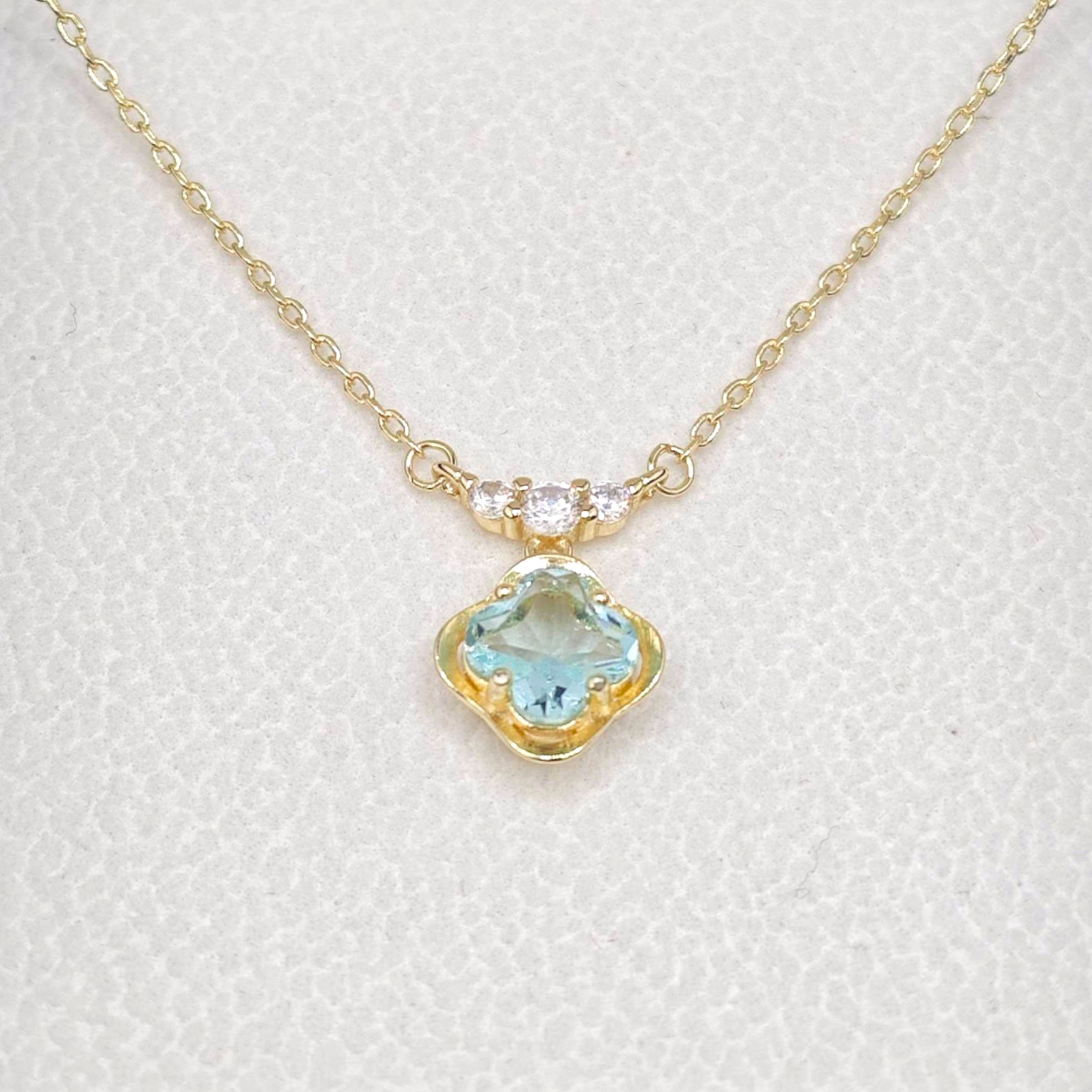 “Étreinte” French Cross Blue Topaz-Style Pendant Necklace — 14K Gold‑Plated