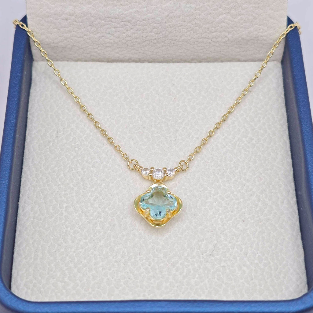 “Étreinte” French Cross Blue Topaz-Style Pendant Necklace — 14K Gold‑Plated