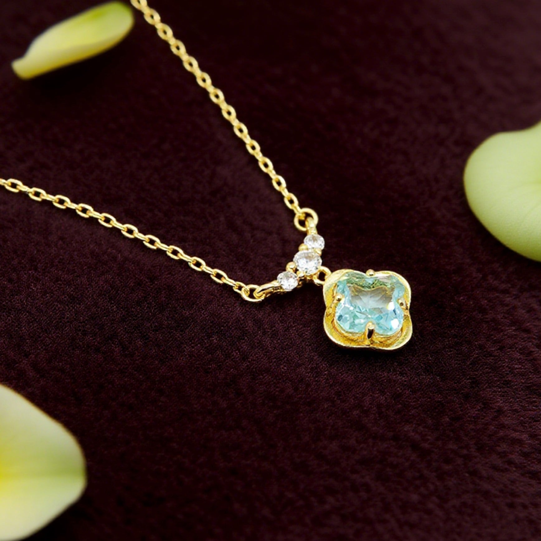 “Étreinte” French Cross Blue Topaz-Style Pendant Necklace — 14K Gold‑Plated