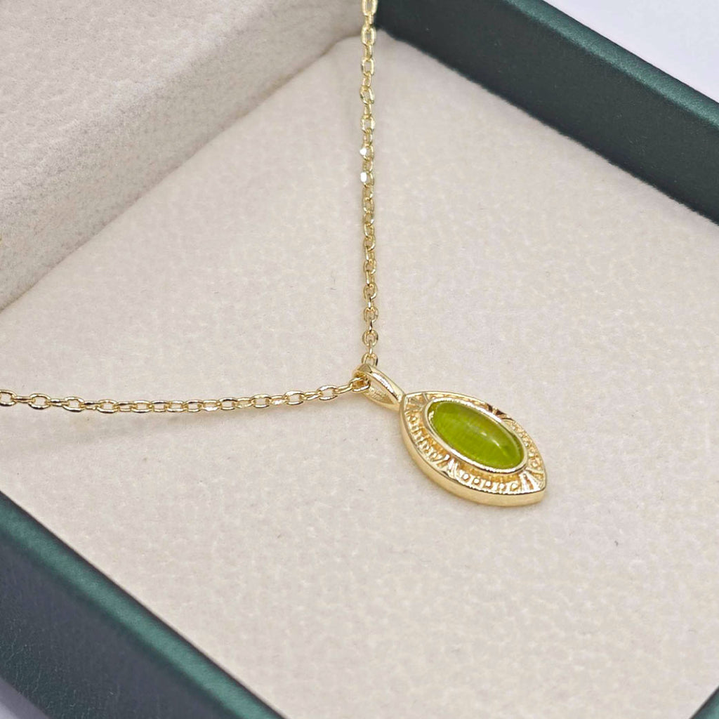 “Étreinte” Oval Green Crystal Pendant Necklace — 14K Gold‑Plated