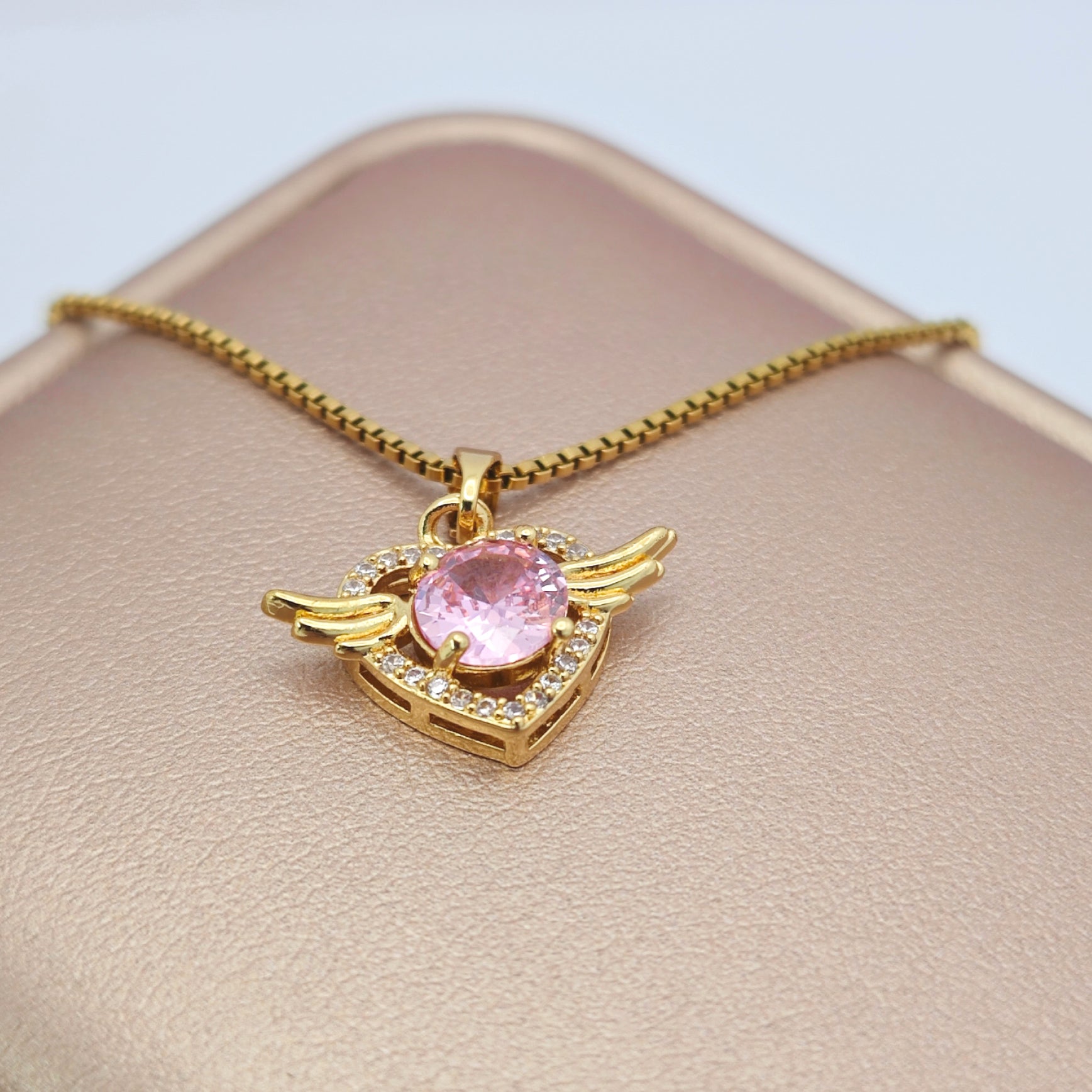 “Étreinte” Angel Heart Pendant Necklace — 18K Gold‑Plated, Pink Diamond‑Style