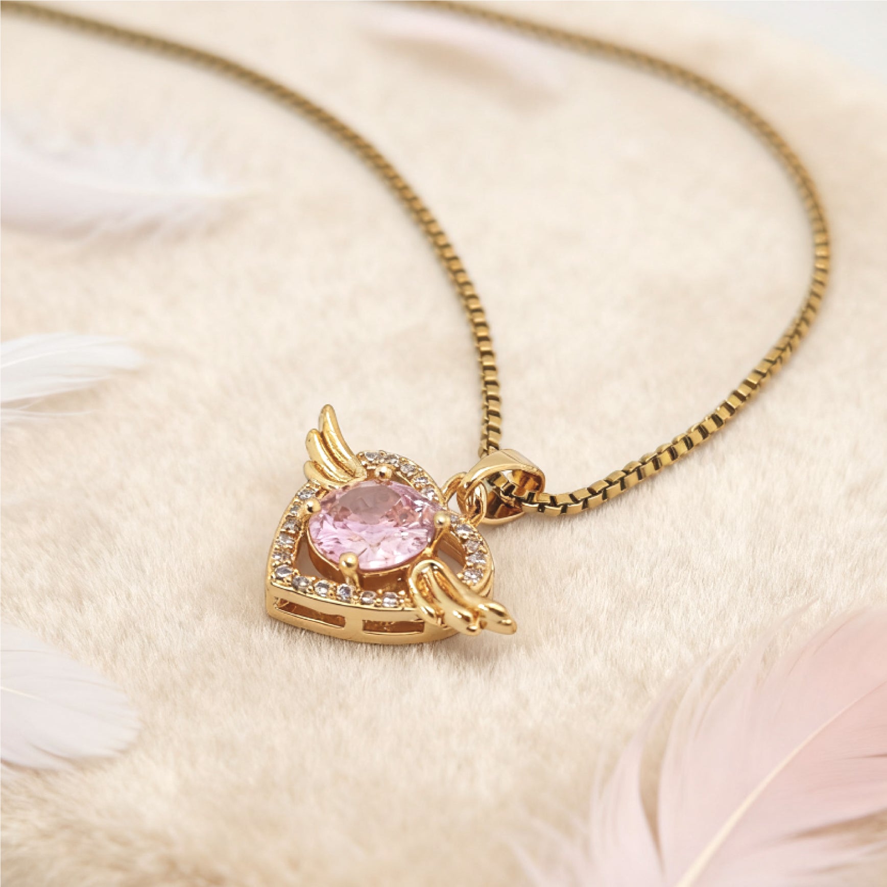 “Étreinte” Angel Heart Pendant Necklace — 18K Gold‑Plated, Pink Diamond‑Style