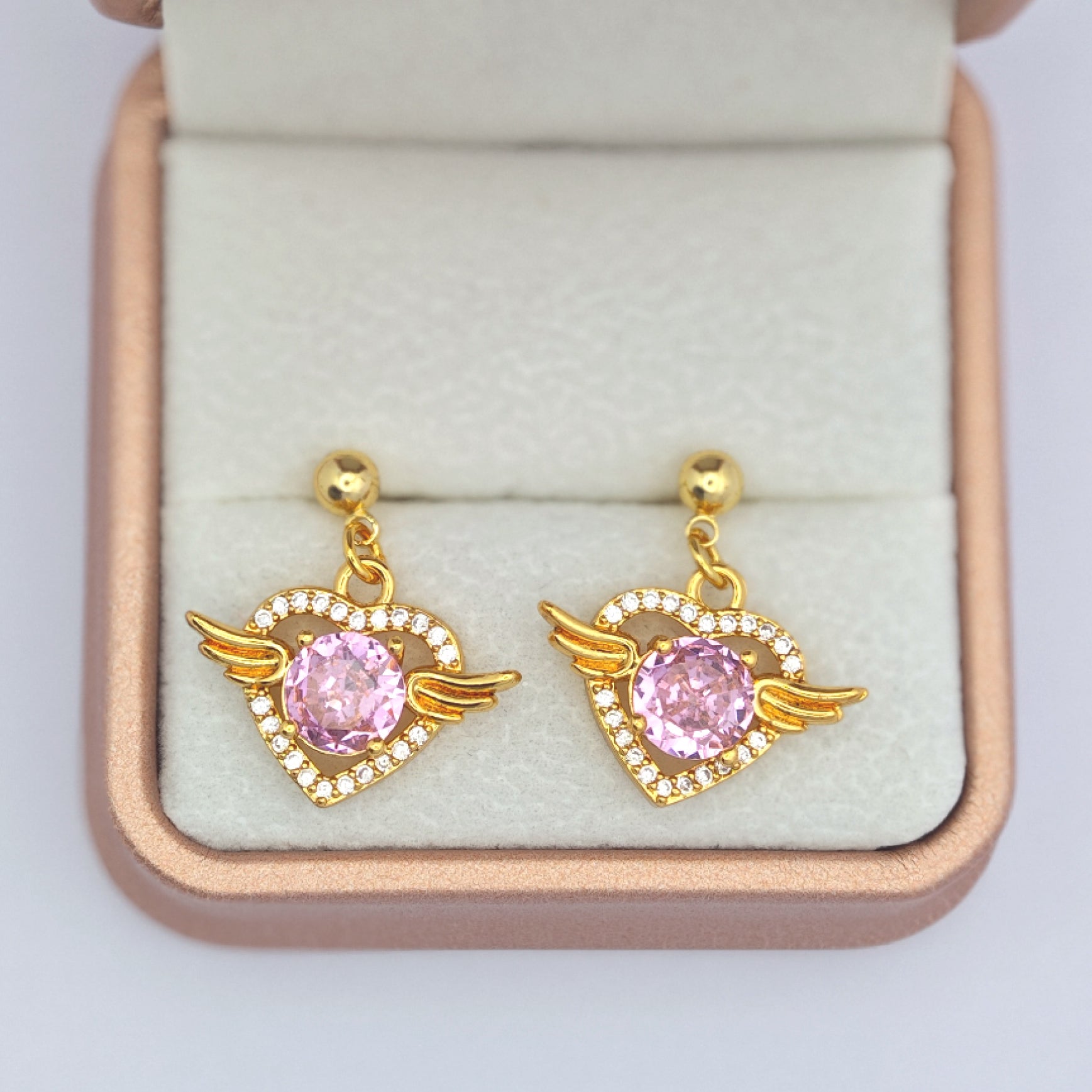 “Éclat” Angel Wing Heart Drop Earrings — 18K Gold‑Plated, Pink Diamond‑Style