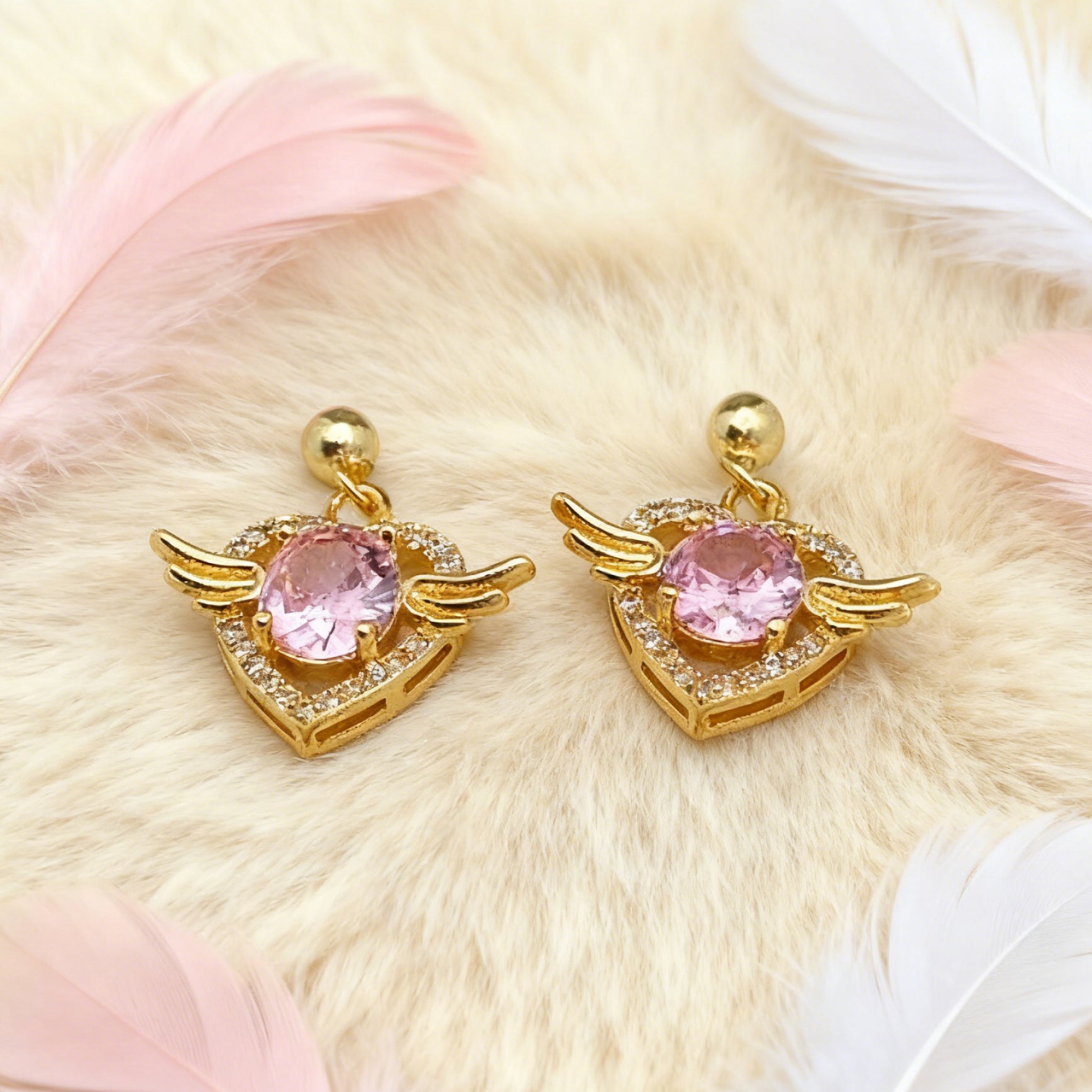 “Éclat” Angel Wing Heart Drop Earrings — 18K Gold‑Plated, Pink Diamond‑Style