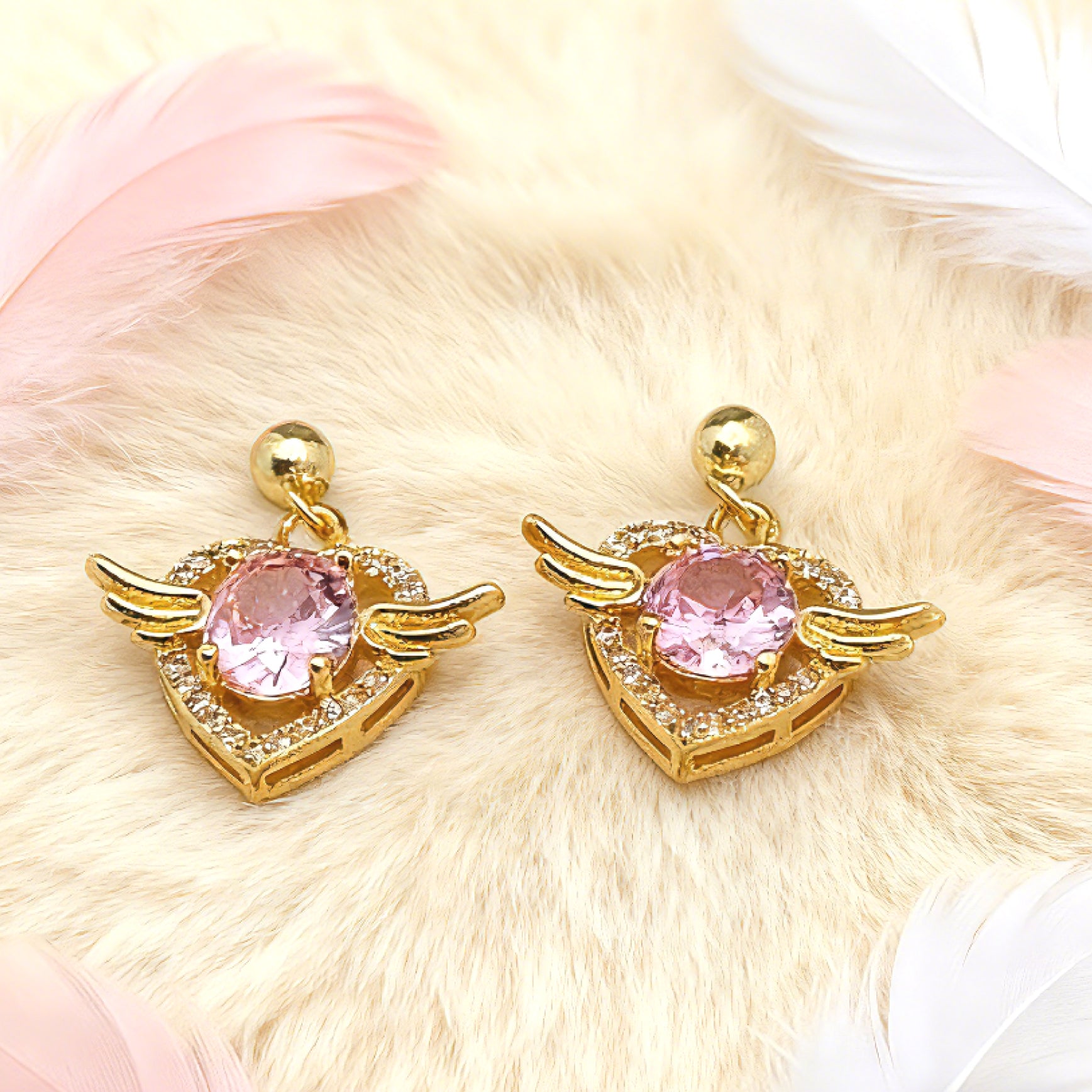 “Éclat” Angel Wing Heart Drop Earrings — 18K Gold‑Plated, Pink Diamond‑Style