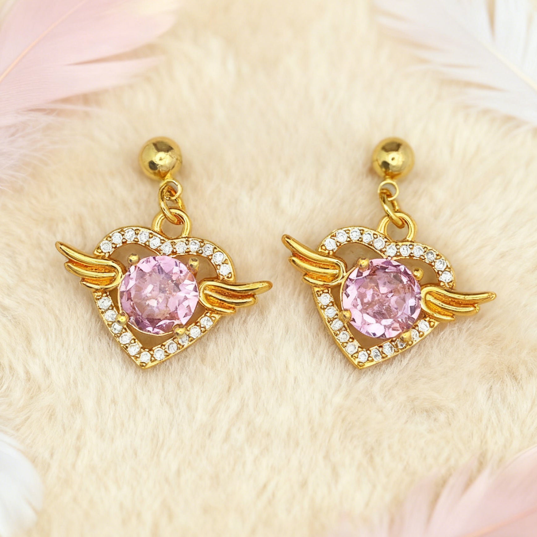 “Éclat” Angel Wing Heart Drop Earrings — 18K Gold‑Plated, Pink Diamond‑Style