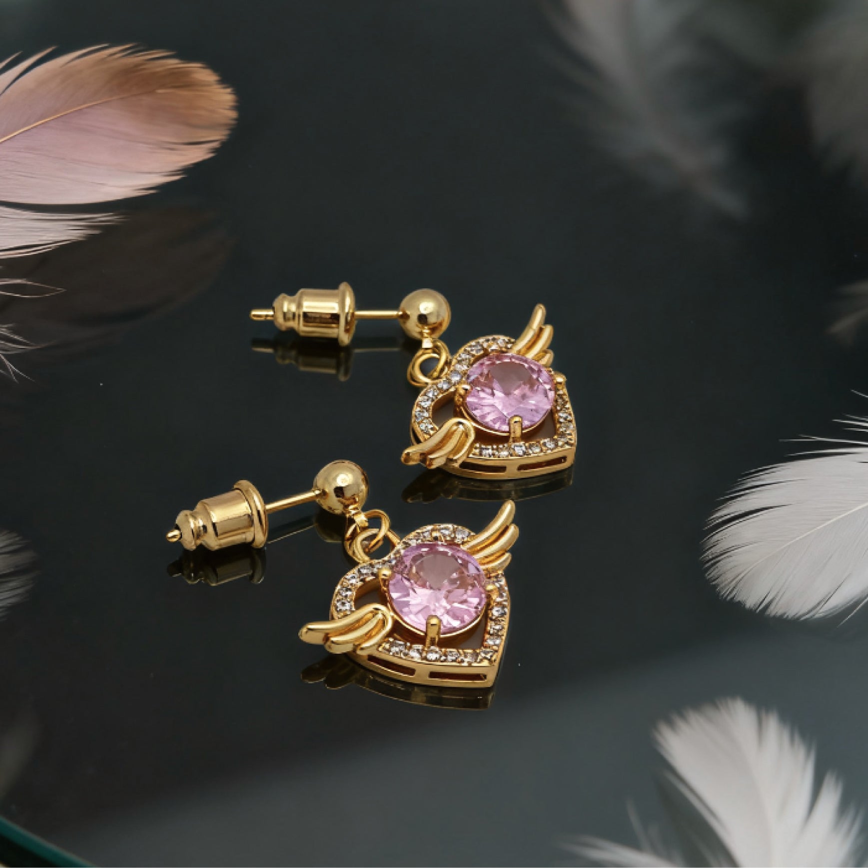 “Éclat” Angel Wing Heart Drop Earrings — 18K Gold‑Plated, Pink Diamond‑Style