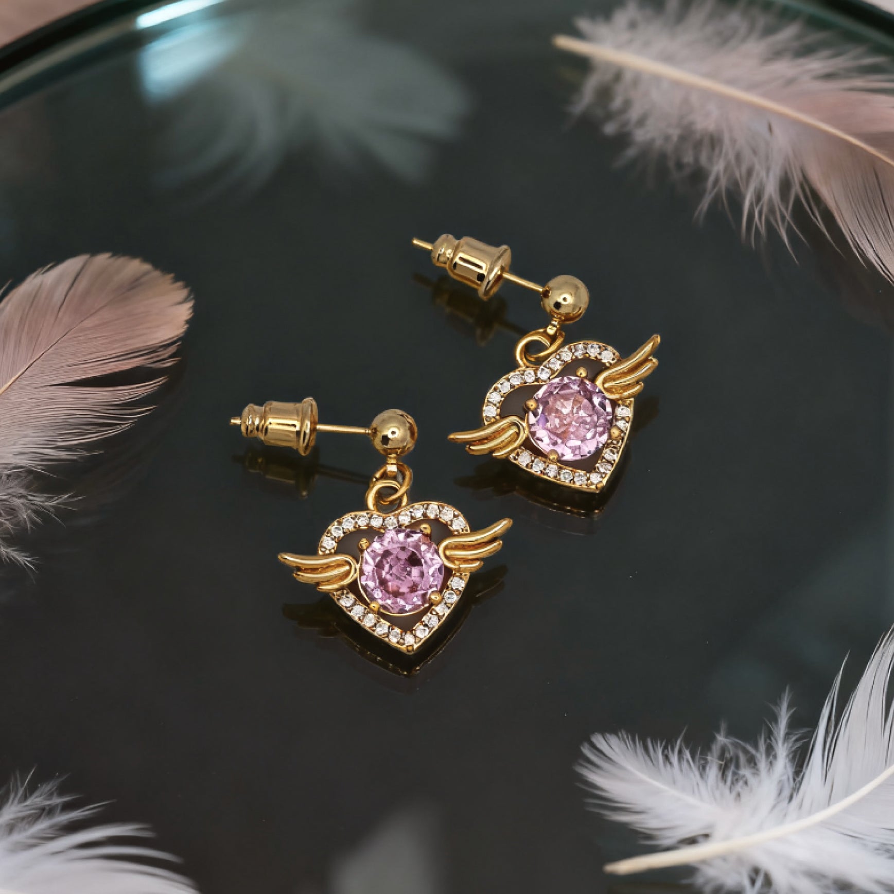 “Éclat” Angel Wing Heart Drop Earrings — 18K Gold‑Plated, Pink Diamond‑Style