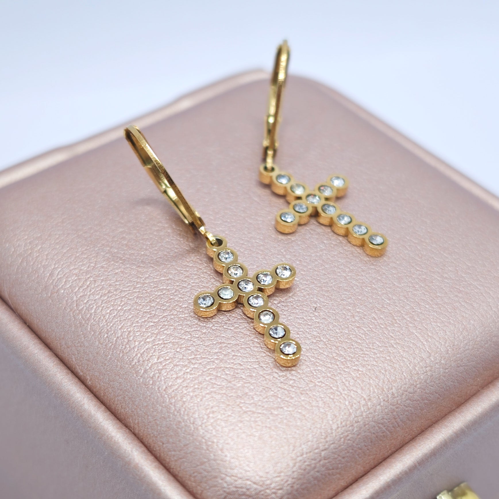 “Éclat” Bezel Pavé Cross Leverback Earrings — 18K Gold‑Plated, Diamond‑Style