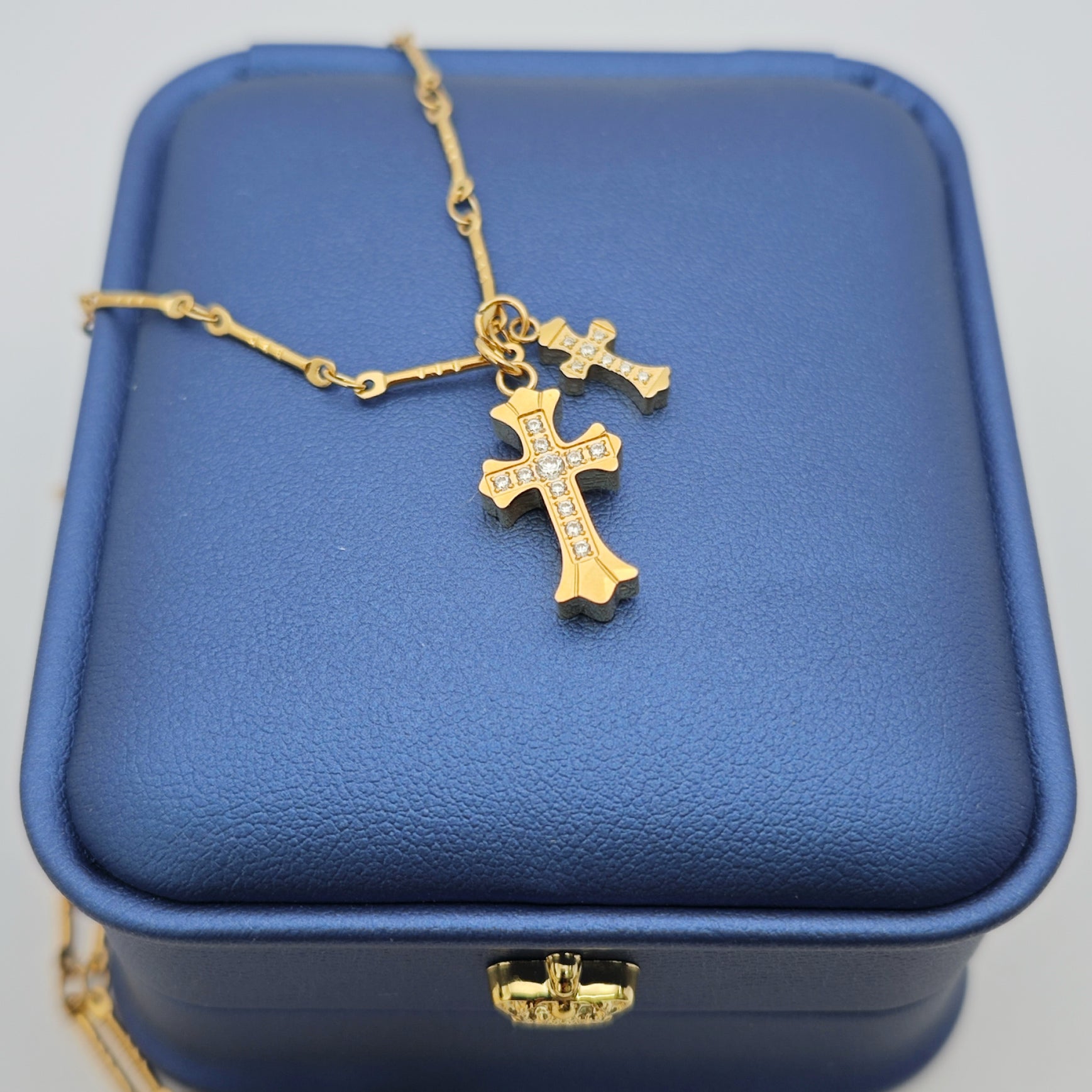 “Étreinte” Duo Cross Charm Necklace — 18K Gold‑Plated, Diamond‑Style