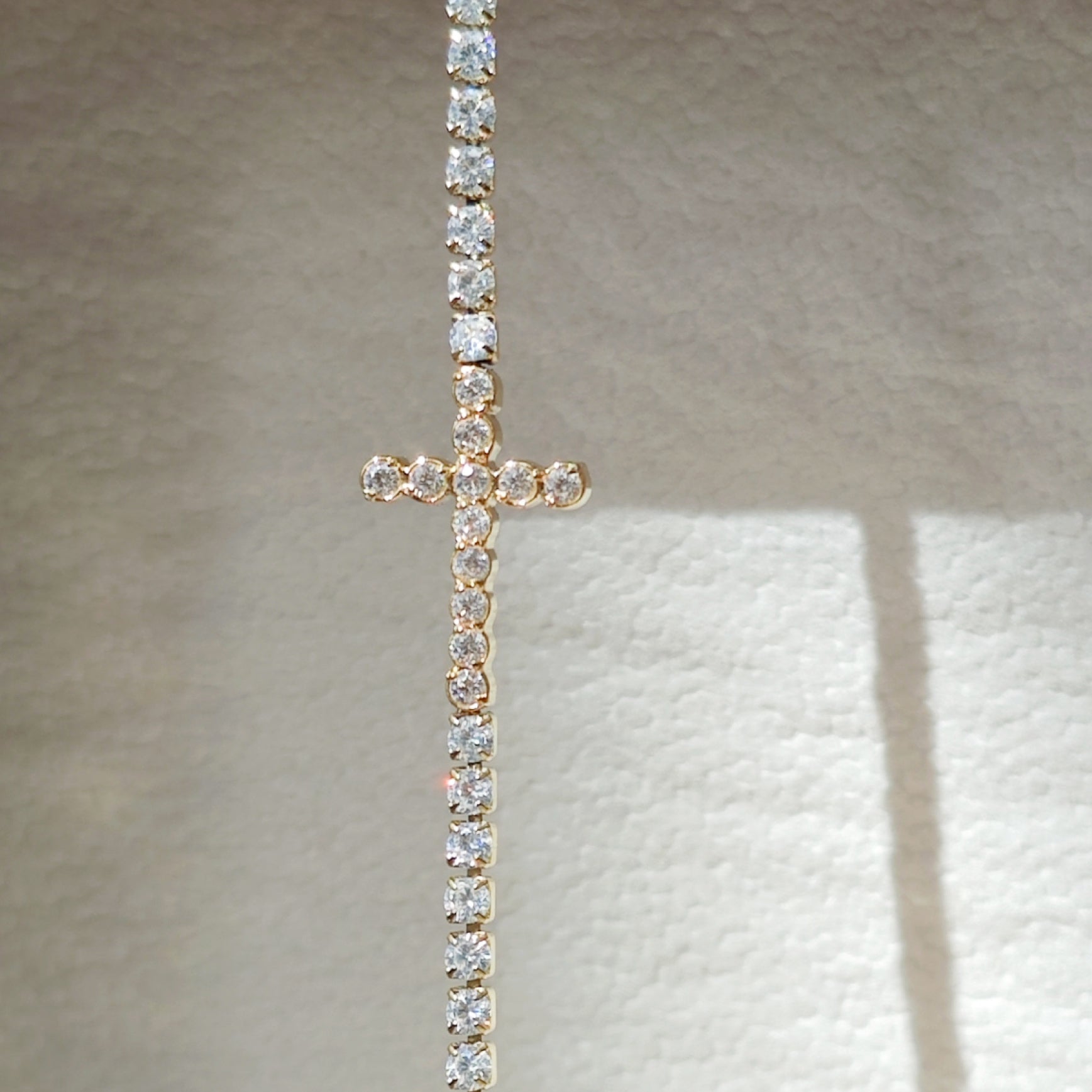 “Lien” Cross Tennis Bracelet — 18K Gold‑Plated, High-grade CZ