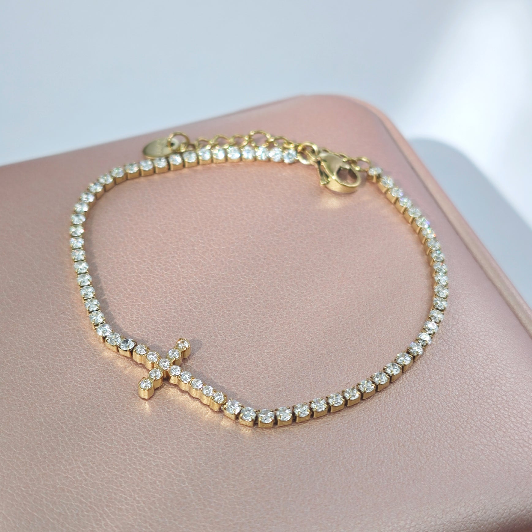 “Lien” Cross Tennis Bracelet — 18K Gold‑Plated, High-grade CZ