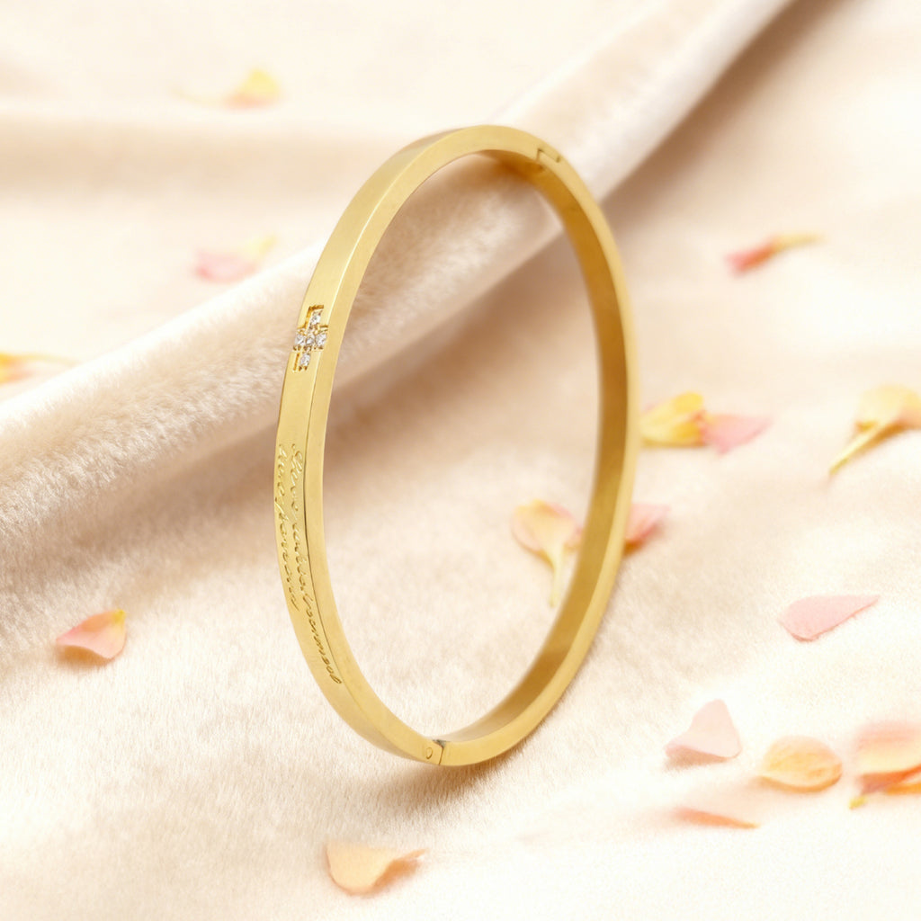 “Lien” Cross-Clasp Bangle — 18K Gold‑Plated, High-grade CZ