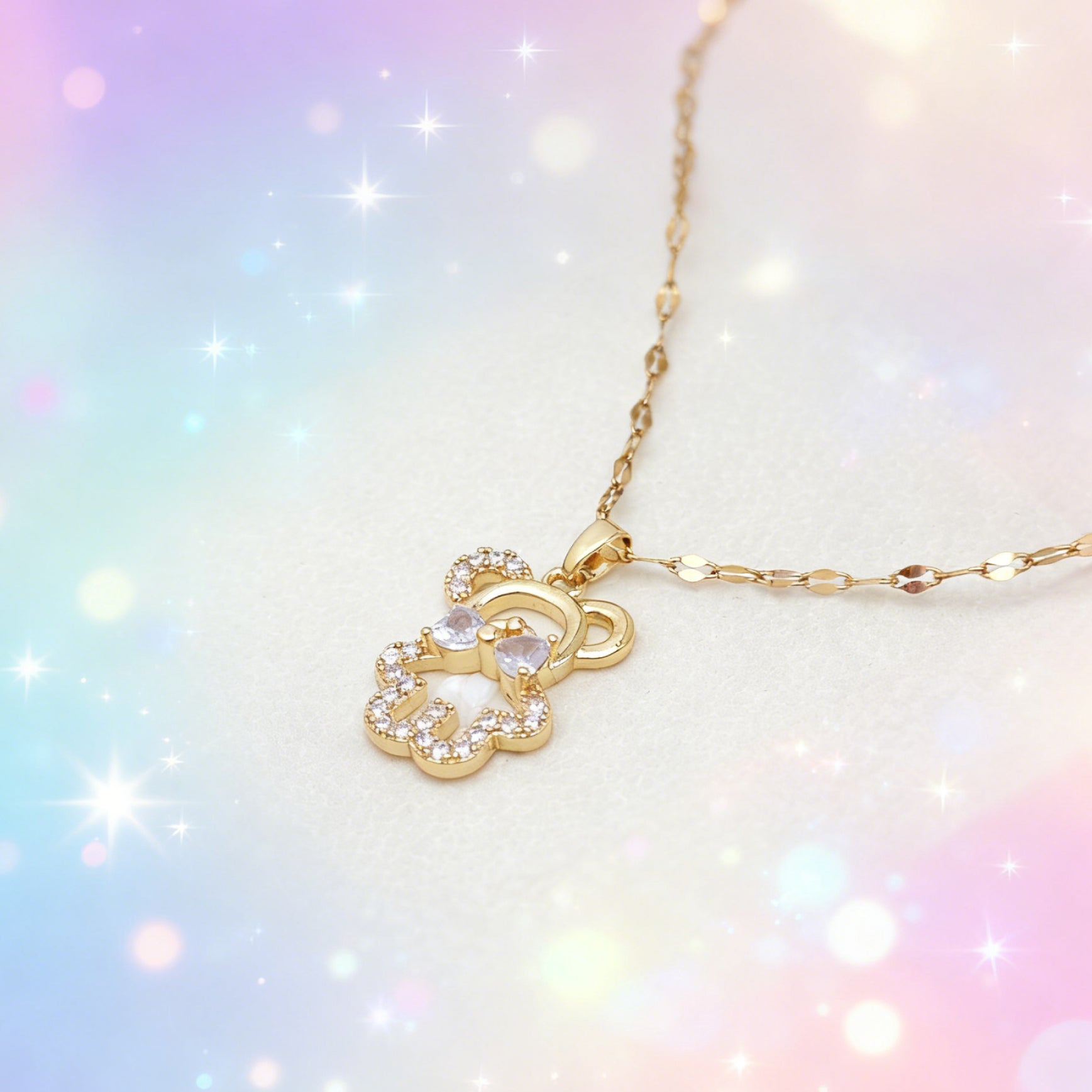 “Étreinte” Bow‑Teddy Pavé Pendant Necklace — 18K Gold‑Plated, Diamond‑Style