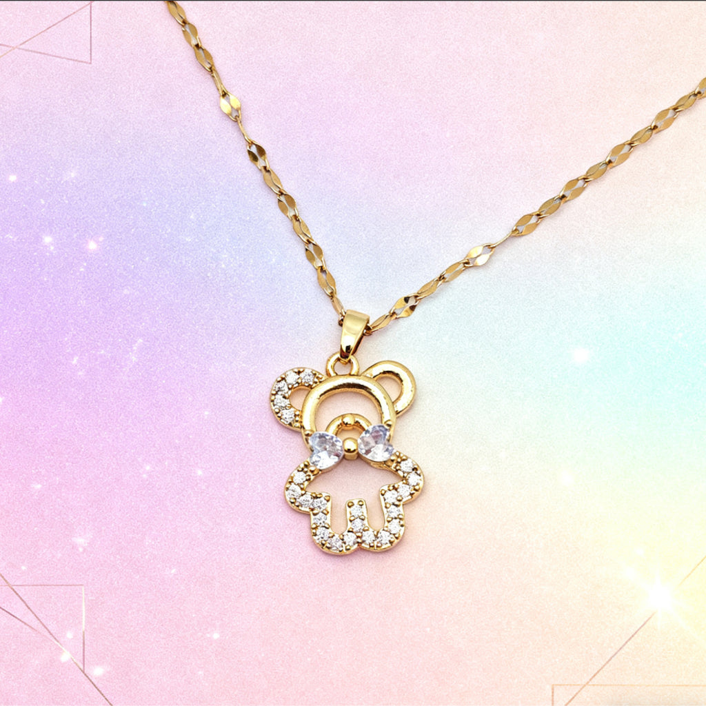 “Étreinte” Bow‑Teddy Pavé Pendant Necklace — 18K Gold‑Plated, Diamond‑Style