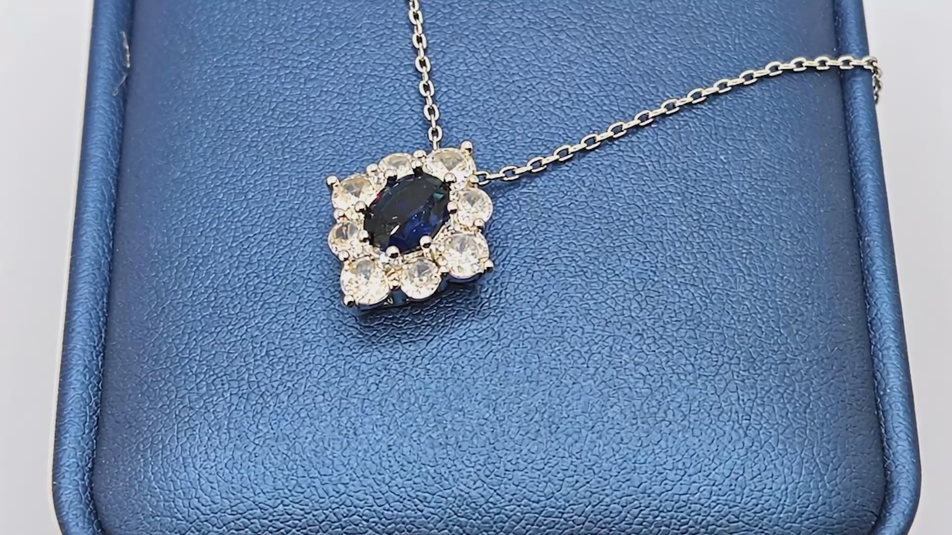 “Étreinte” Royal Halo Pendant Necklace — Platinum‑Tone, Tanzanite‑Blue L’Ardeur Crystal