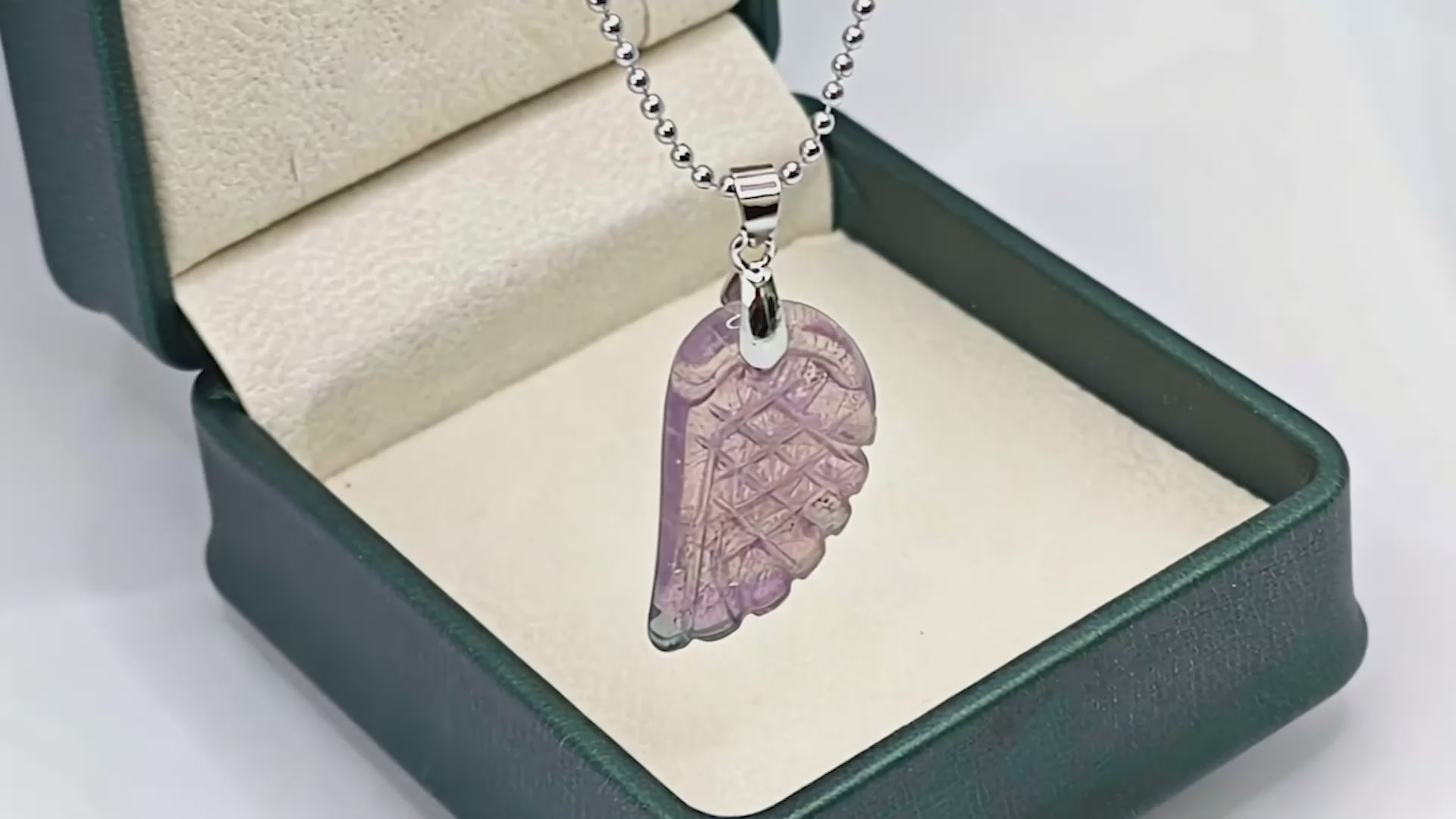 “Léger” Angel Wing Pendant — Hand‑Cut Rainbow Fluorite